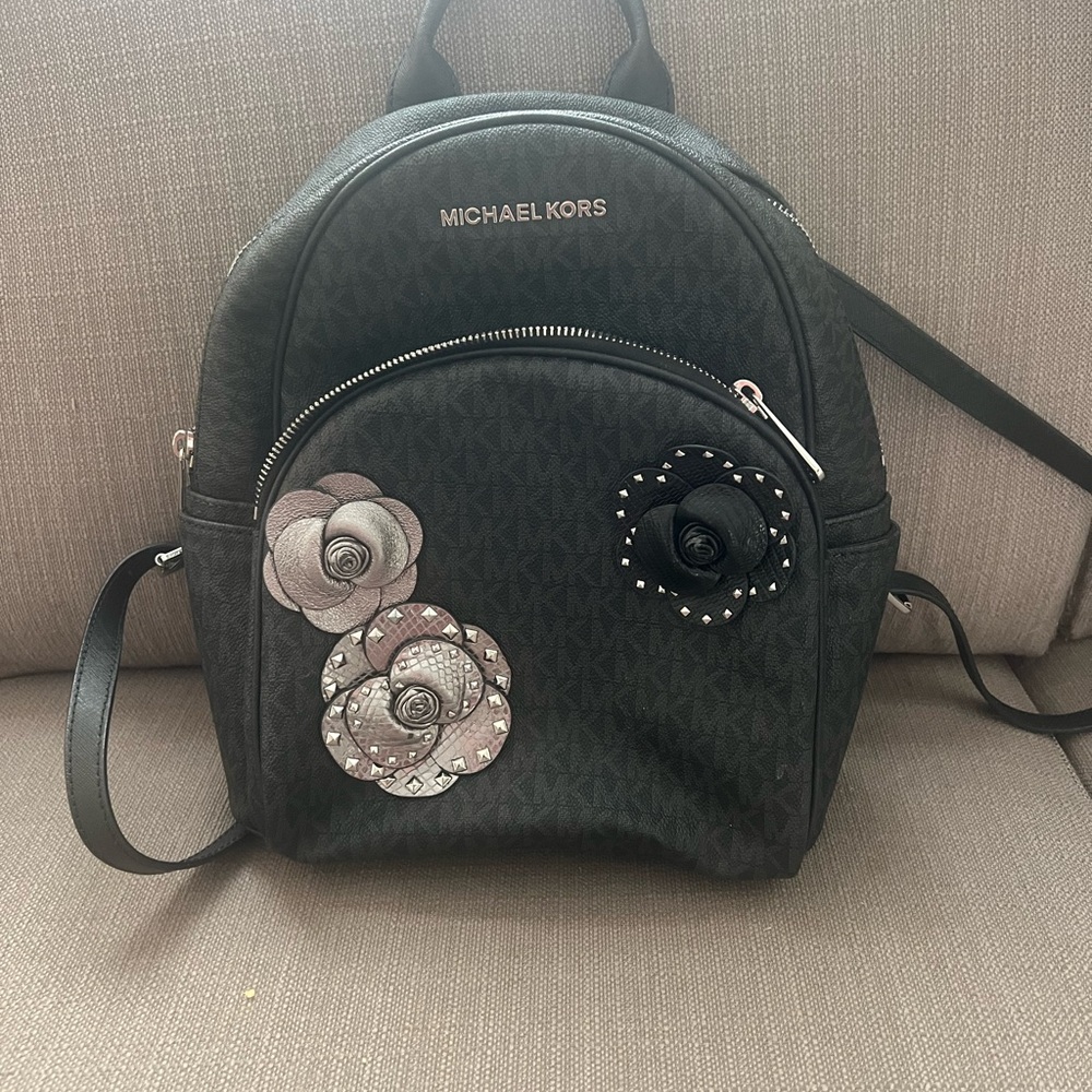 Michael Kors Black and Silver Backpack with Floral Accents